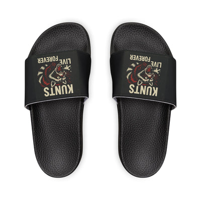 Black textured slide sandals with adjustable straps featuring a rebellious raccoon graphic and "Kunts Live Forever" text